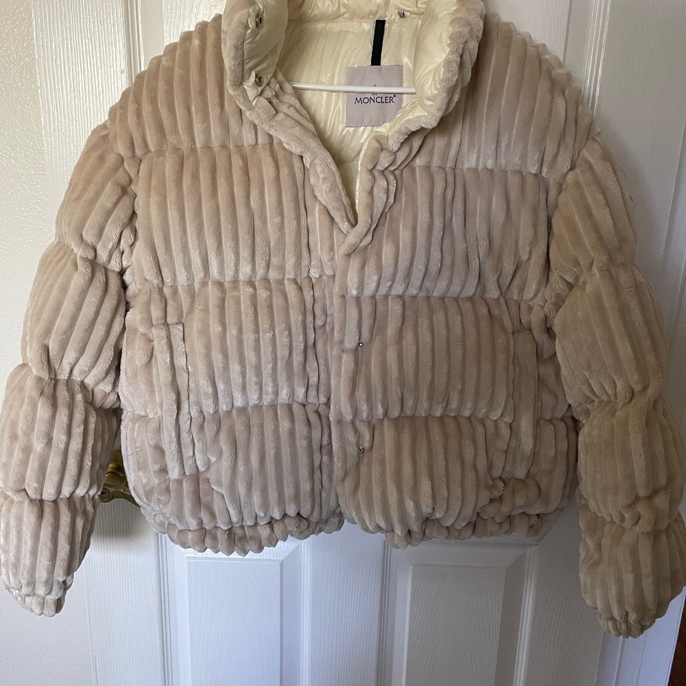 Puffy white Moncler jacket